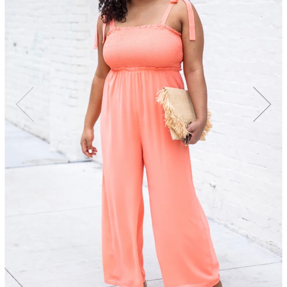 Pink lily jumpsuit in coral.